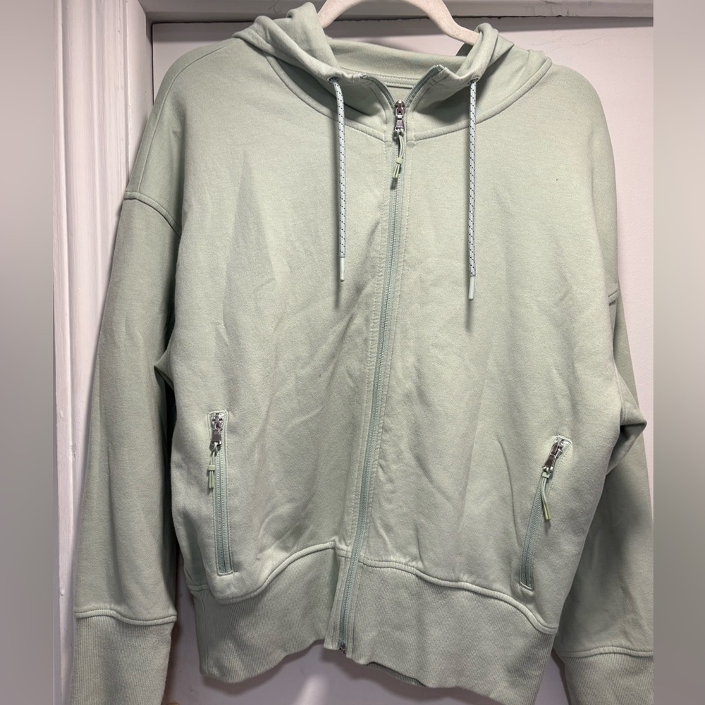 Sage Green Zip-Up Hoodie Size Large
2 Zippered pockets